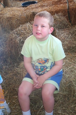 Avery in a haystack.JPG
